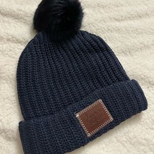 NEVER WORN LOVE YOUR MELON BEANIE NAVY COLOR DETACHABLE PUFF